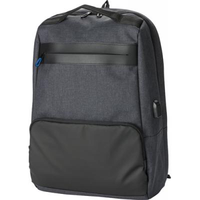 PVC backpack with anti-theft back pocket.